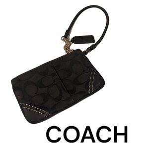 Authentic Coach signature small wristlet with Coach tag